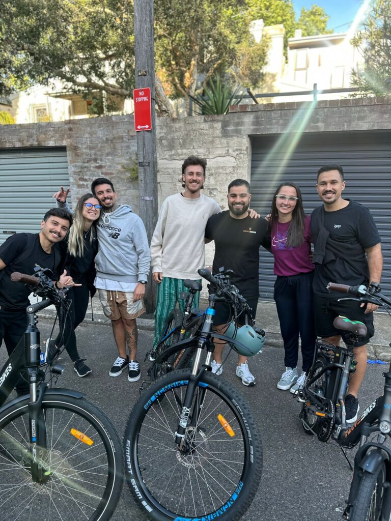 Group-of-international-students-on-the-street-with-electric-bikes-after-attending-a-workshop-with-MoveBikes
